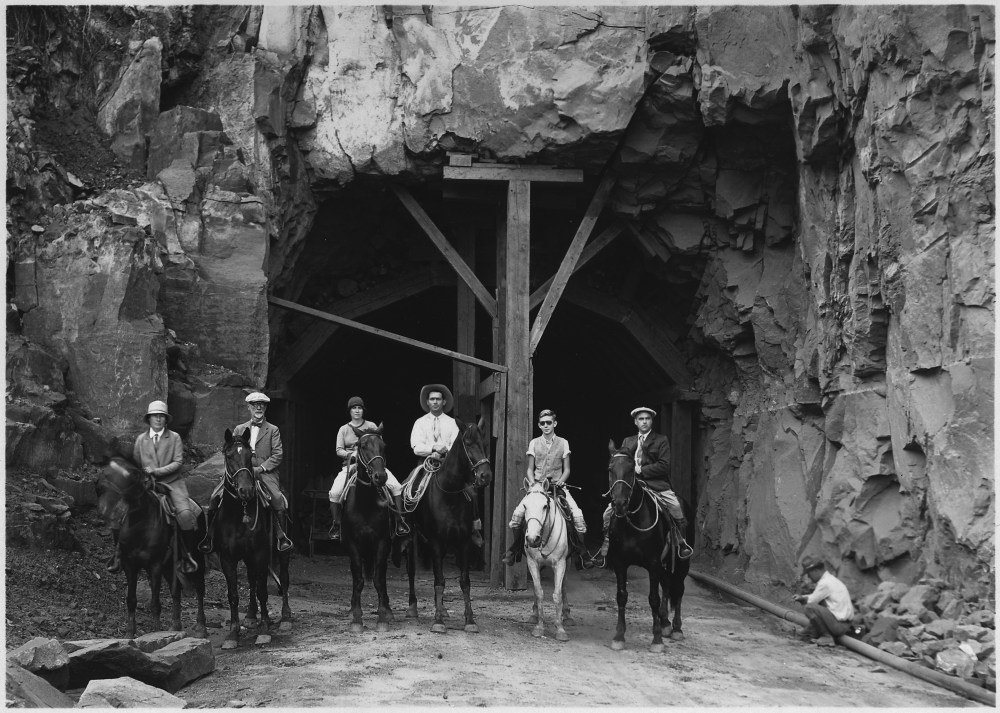 Horseback_party_at_west_entrance_to_Zion_Tunnel._This_tunnel_will_shorten_the_distance_from_Zion_to_Bryce_by_70..._-_NARA_-_520397